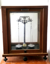 Scientific Balance Scales in glass display cabinet by G&W George and Becker Ltd