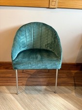 Teal tub chair, chrome effect legs