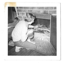 VTG B&W Found Photo Snapshot Home Interior Short Haired Woman Fireplace Firewood
