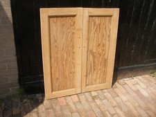 Pair of reclaimed 1930s stripped pine cupboard doors