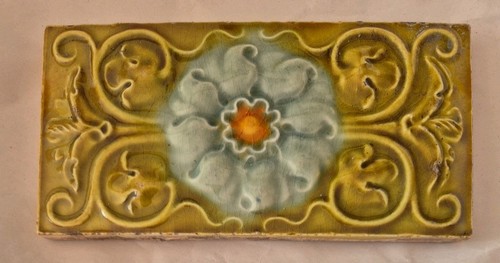 Antique tile fireplace spacer