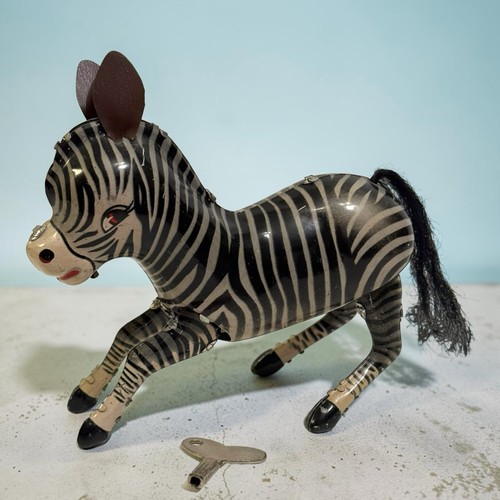 Vintage jumping zebra tin - jumping,