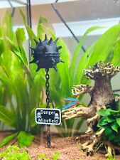 Floating aquarium sea mine
