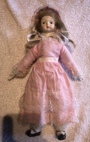 Old porcelain doll - old,