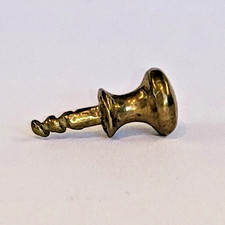 Small cast brass knob Queen