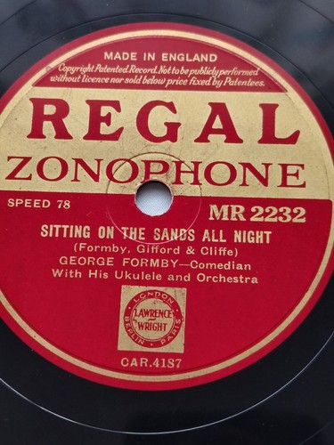George formby sitting the - sitting,