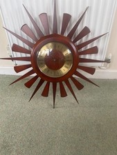 Vintage Spectrum starburst shape teak wall cock