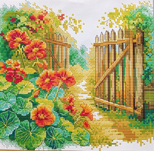 Flowers By The Fence -