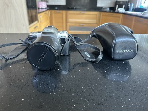 Pentax slr with sigma - with,