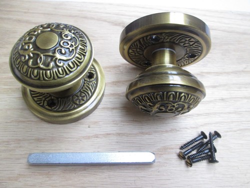Pair solid brass sprung - ,