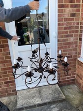 lights, chandelier, bronze delicate leaf design, eight arms with candle bulbs 