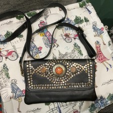 UNUSUAL LEATHER CROSSBODY BAG