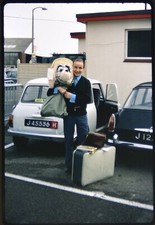 35mm Slide Man Poses with Toy