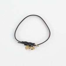 ALEXANDER MCQUEEN Bracelet Black Leather Wrap Gold Buckle Skull Charm OS RRP 170