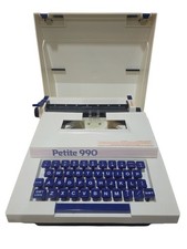 Vintage Petite 990 Typewriter