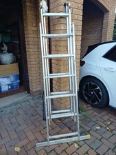 3 Piece Extending Ladder 18 Rungs.  Well Used But Still Fine