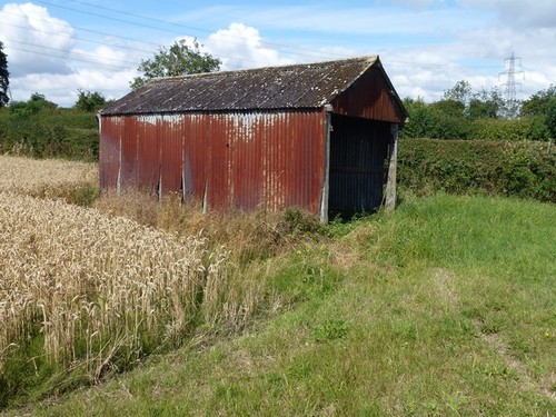 Photo rusty tin shed - rusty,