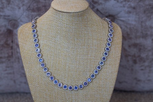 Tanzanite white zircon - &,