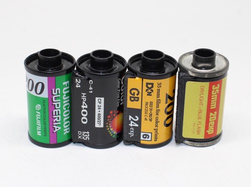 Four 35mm film rolls - film,