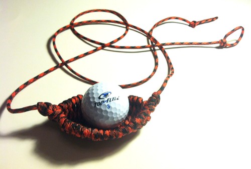 Golf ball rock thrower - rock,