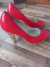 Red stilettos high heel shoes