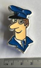 Collectible plastic pin badge