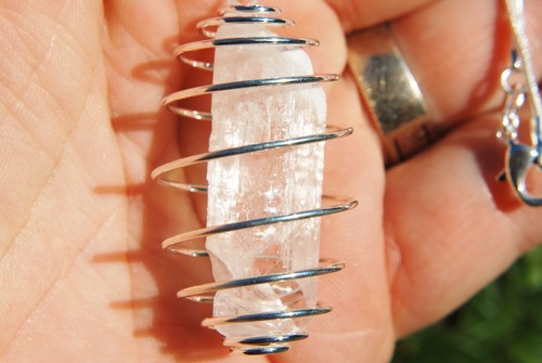 Charged danburite crystal - charged,