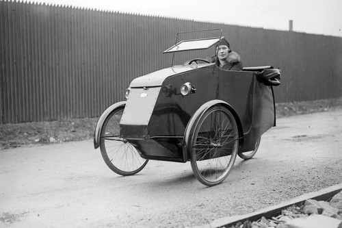 Woman riding three wheeler - woman, three-wheeler