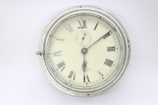 A Antique Smiths Empire Naval Ships Clock with Key Running Requires A Clean