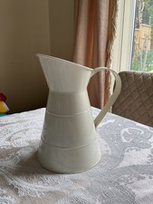 cream metal jug / pitcher
