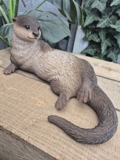 LAYING OTTER FIGURE by Vivid
