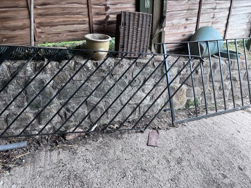 Black metal fence railing - fence,