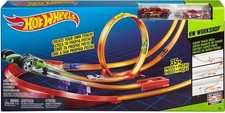 Hot Wheels track inc curve, loop the loop, launchers and megahauler transporter