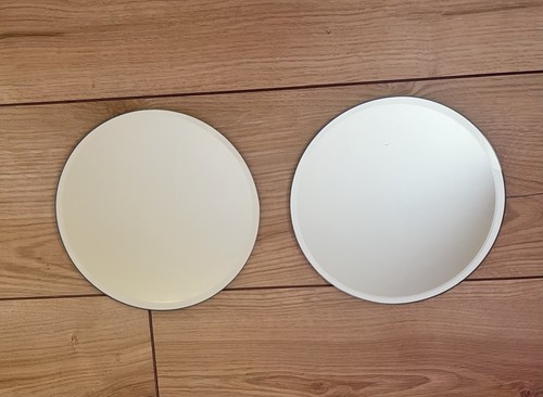 Pair decorative round glass - of,
