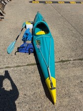Single seat used kayak, blue, includes paddle, helmet, Fareham 