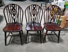 3 wheelback chairs vintage