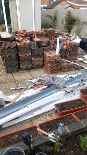 Red clay roof tiles job - red,