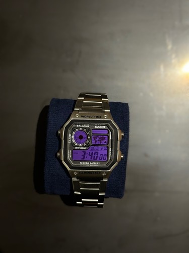 Purple casio world time - world,