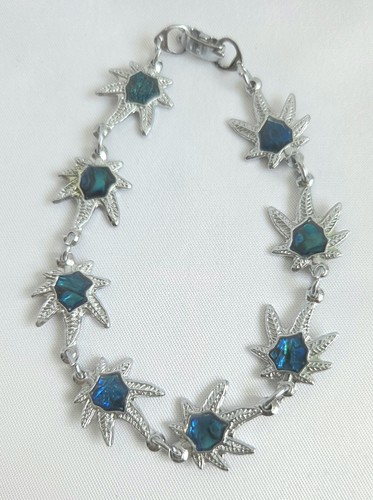 Silver coloured leaf shaped - silver,