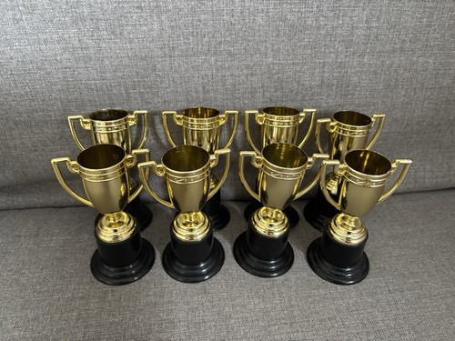 Gold trophy cups - 8, trophies