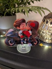 Biker Couple On Motorbike