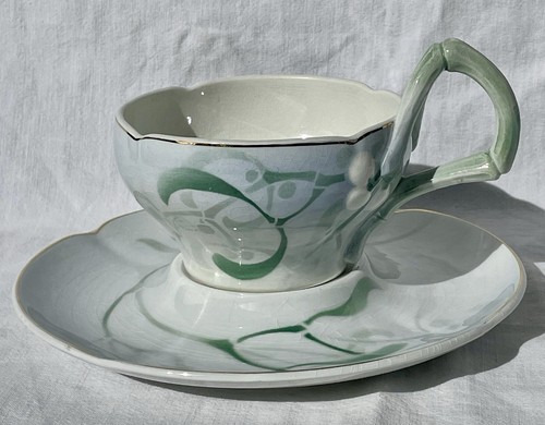 Mug and saucer the faience - mug, a