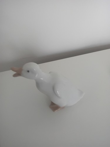 Nao lladro porcelain - by,