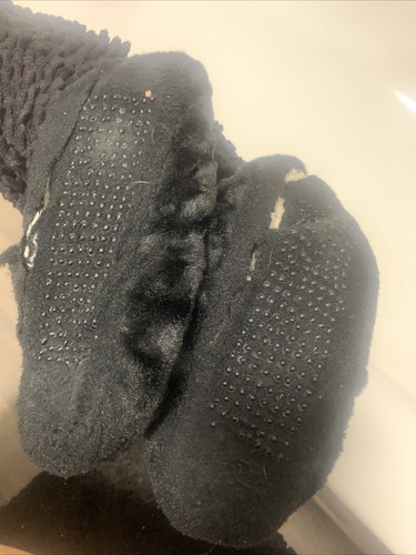 Worn ladies slippers - worn,