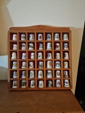 42 x places thimbles in wood display rack