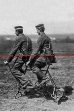 F007564 Filling a barrage balloon using a converted tandem bicycle 1914 WW1
