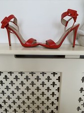Guess  patent  coral/red ankle