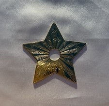 Dior golden star ornament