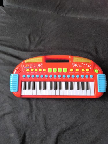 Piano player toy - electric,