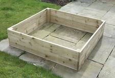 Wooden raised bed treated - bed.,